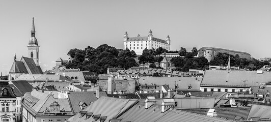 Bratislava, Slovakia: Panoramic rooftop view of Bratislava Castle, the cathedral and the old town - 728056031