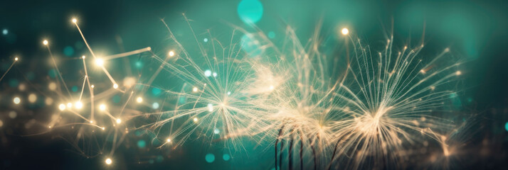 sparking sparkler in the green area. sparkler fire with blurred bokeh background. new year or St. Patrick's Day. banner