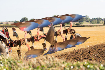 tractor ploughing a field 
