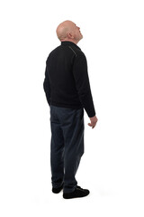 back side view of a man looking up on white background