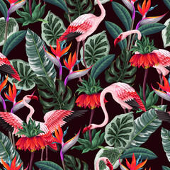 Seamless pattern with pink flamingos and exotic flowers. Vector.