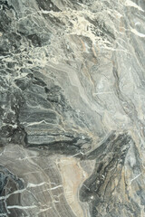Grey and white marble stone texture with amazing patterns created by nature. Ecological and expensive material for surface adornment in luxurious interior design