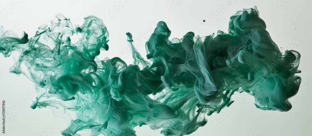 Poster mesmerizing green liquid ink transforms water into abstract forms