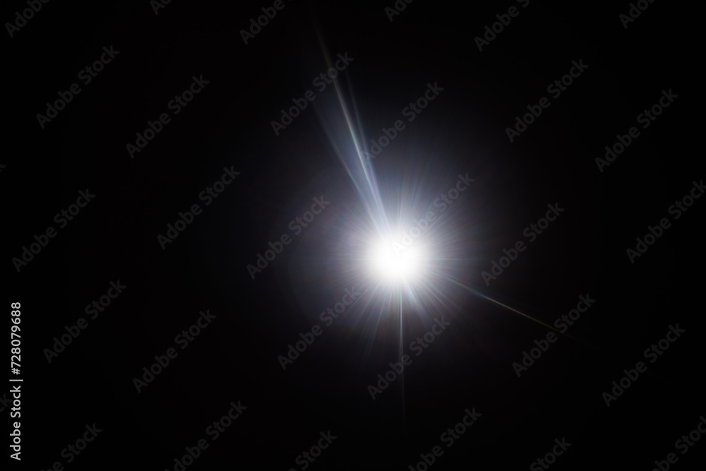 Poster Easy to add lens flare effects for overlay designs or screen blending mode to make high-quality images. Abstract sun burst, digital flare, iridescent glare over black background.