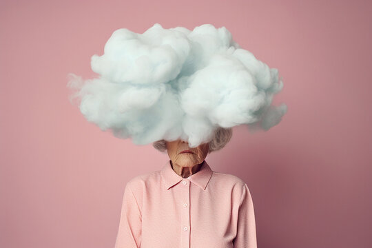 Old woman with her head in cloud. Concept of memory loss, dementia, decreased mind function. Loneliness, time flow, depression, mental health concept. Psychology theme, dreaming. Alzheimer's disease