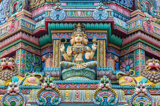 Colored decorations and statues on the exterior of the Hindu Temple Sri Maha Mariamman Temple ("Wat Phra Si Maha Umathewi") on Si Lom Road in Bangkok, Thailand. Built in 1879.
