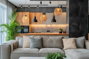 Pendant lights hanging on ceiling in modern room 