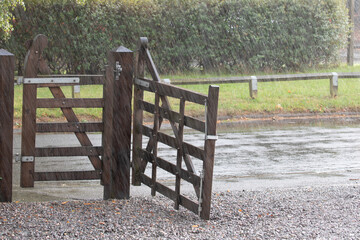 wooden gate in the rain