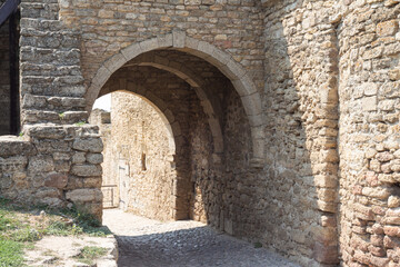 Fototapeta na wymiar Entrance stone arched gate on Bilhorod-Dnistrovskyi fortress or Akkerman fortress (also known as Kokot). Bilhorod-Dnistrovskyi. Ukraine