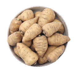 Tubers of turnip rooted chervil in bowl isolated on white, top view