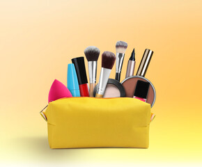 Cosmetic bag filled with makeup products on color gradient background