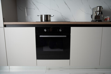 Black built in electric oven in a kitchen