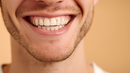 Detailed image of young man smiling with perfect white teeth