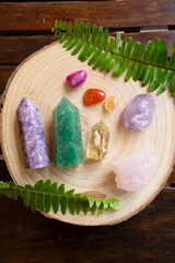 Healing crystals on brown background
