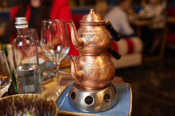 tea urn with glass of tea turkish style