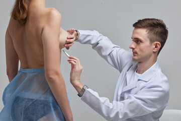 Breast Augmentation. Closeup Beautician Hands In Gloves Drawing Surgical Lines On Beautiful Woman...