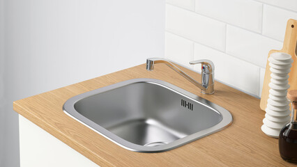 Closeup of a modern kitchen sink.