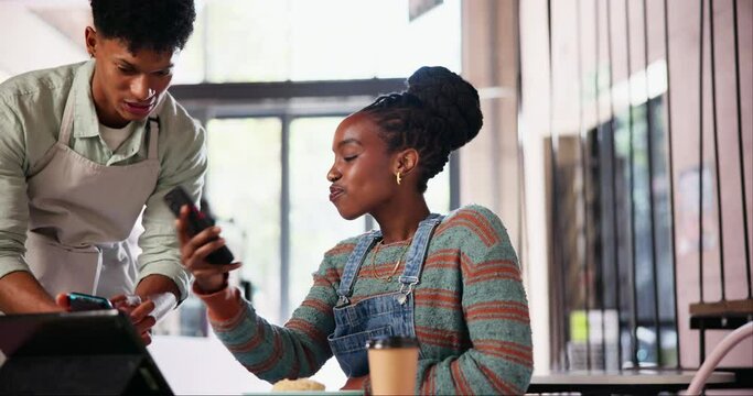 Cafe, man and woman with pos, phone and easy payment in coffee shop for check, kindness or service. Waiter, people and smartphone with fintech app for paperless transaction in cafeteria with smile