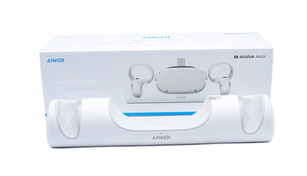 Ocala, Florida 2-3-2024 meta quest 2 Advanced All In One Virtual Reality Headset 128 GB virtual reality VR with no wires or cables isolated on white background on anker charging docking station