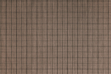 Brown checkered texture fabric, tartan pattern. Shirt fabric, tablecloth textile, linen plaid cloth, classic scottish check pattern. Backdrop, wallpaper, background.