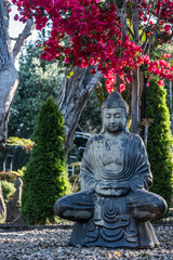 Buddha in the blossoming garden