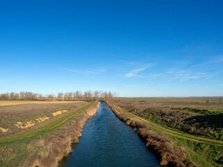 The Canal de Castilla as it passes through the town of Capillas. Palencia, Castile and Leon, Spain.