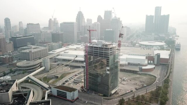 Construction on a building during a hazy morning in Detroit, Michigan.