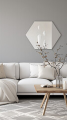 interior of living room with white sofa, wooden coffee table with vase with branch and lamps, grey wall,