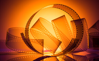 orange gold cinema background with film strip - 728137480