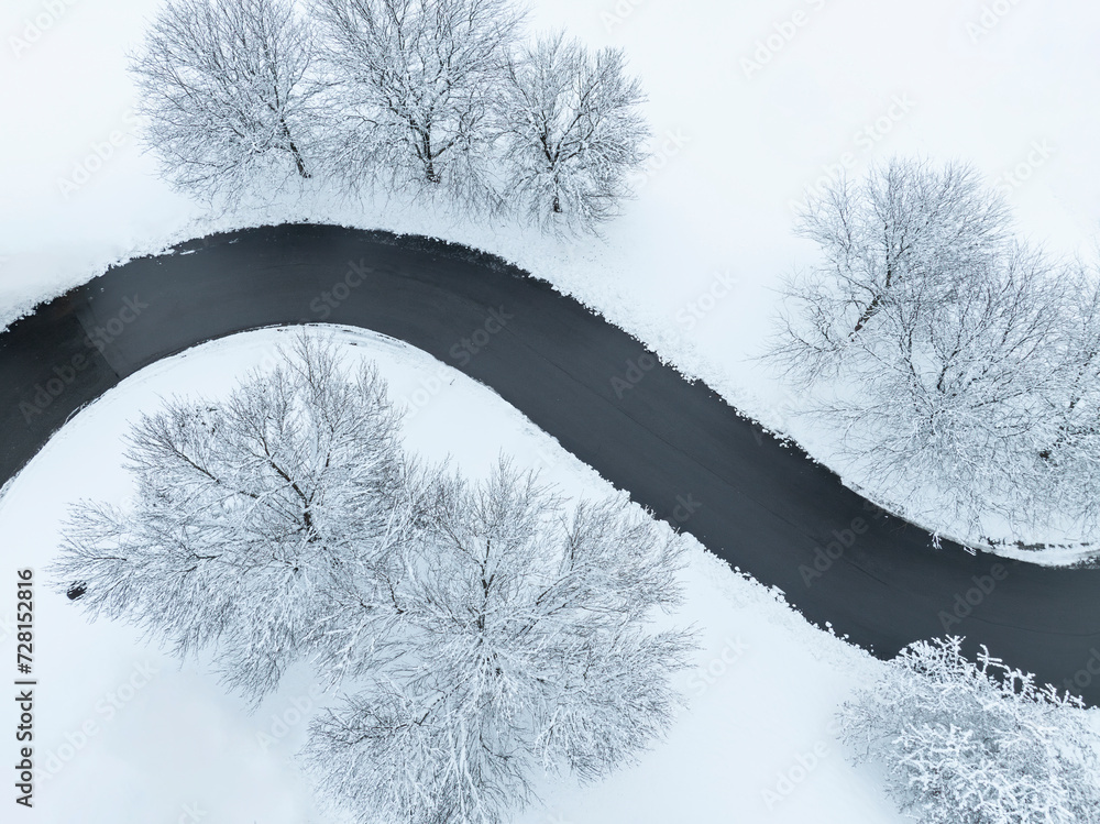 Canvas Prints aerial view of winding road after snow