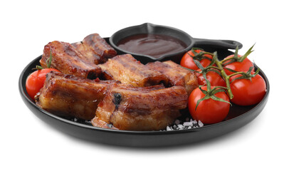 Tasty roasted pork ribs, sauce and tomatoes isolated on white