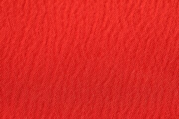 Texture of soft red fabric as background, top view