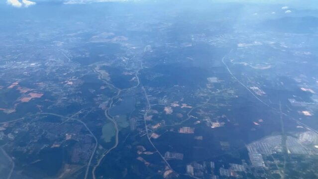 Beautiful aerial view seen through window of flying airplane