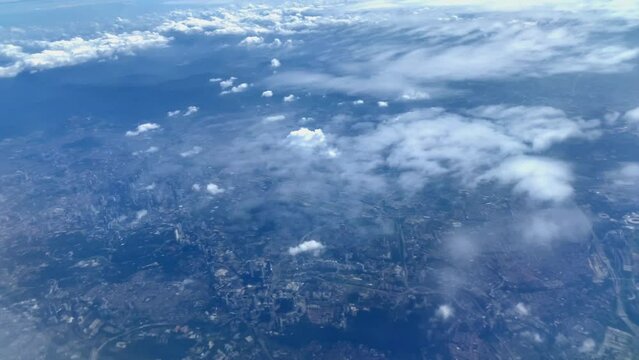 Beautiful aerial view seen through window of flying airplane