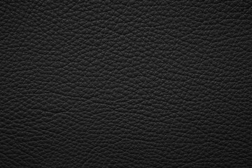 black leather background, natural hide texture closeup