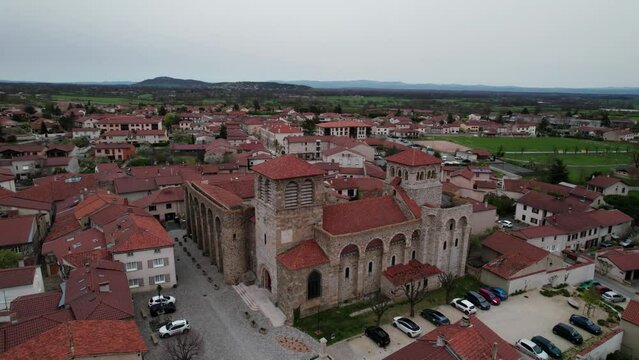 drone shot around the fortified priory church of Champdieu in the Forez near Montbrison, Loire departement, French Countryside