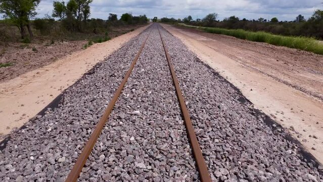 Fresh new railroad tracks and subgrade ballast built up without sleeper bar, aerial dolly