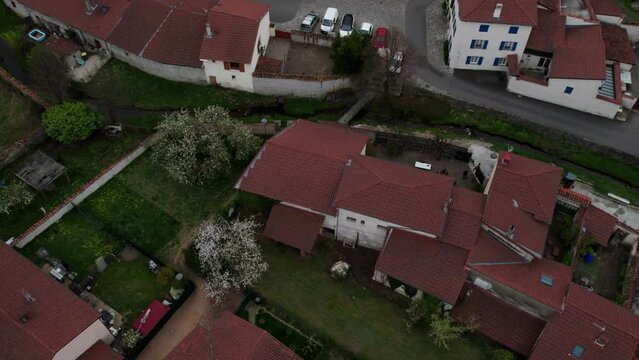 drone shot revealing the fortified church of Champdieu in la Plaine du Forez, Loire departement, France