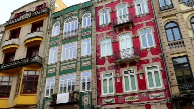 Colorful facades of Porto buildings in Bolhao neighbourhood, pan right