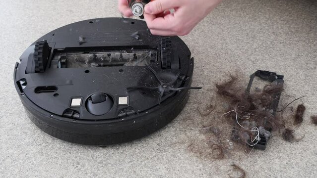Cleaning tangled hair off robot vacuum cleaner, establisher