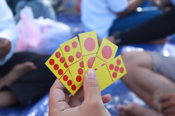 The domino card game in Indonesia is often called gaple or gaplek