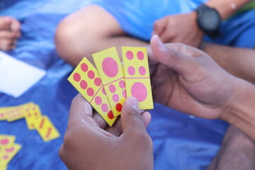 The domino card game in Indonesia is often called gaple or gaplek