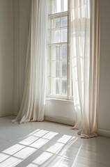 a window with curtains in the sunlight on a white floor