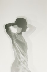 a woman flexing her arms in white space