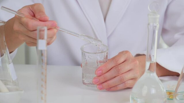 The professional scientist are dermatologist as testing to beauty product for skin, care, and cosmetic in the laboratory. 