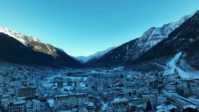 Cold winter morning in the Ski town and Village of Chamonix, France in the European Alps mountains. Aerial Drone Flyover