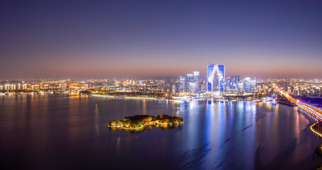 Fototapeta na wymiar Aerial photography of the night view of the city by Jinji Lake in Suzhou.. .笔记.