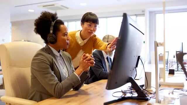Members of a business team cooperating on a project