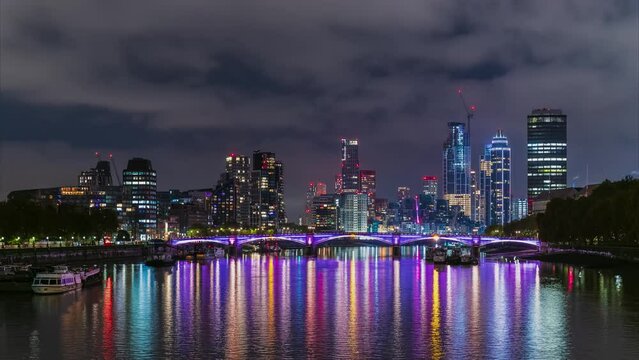 Timelapse view of the Vauxhall skyscrapers and the Lambeth Bridge at night, London, UK.
