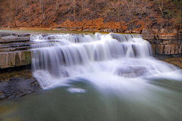 Long exposure winter photo of the lower falls at Taughannock Falls State Park near Ithaca NY.	(02-03-2024)